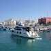 Un catamarano usato per le feste in barca nel porto di Monopoli